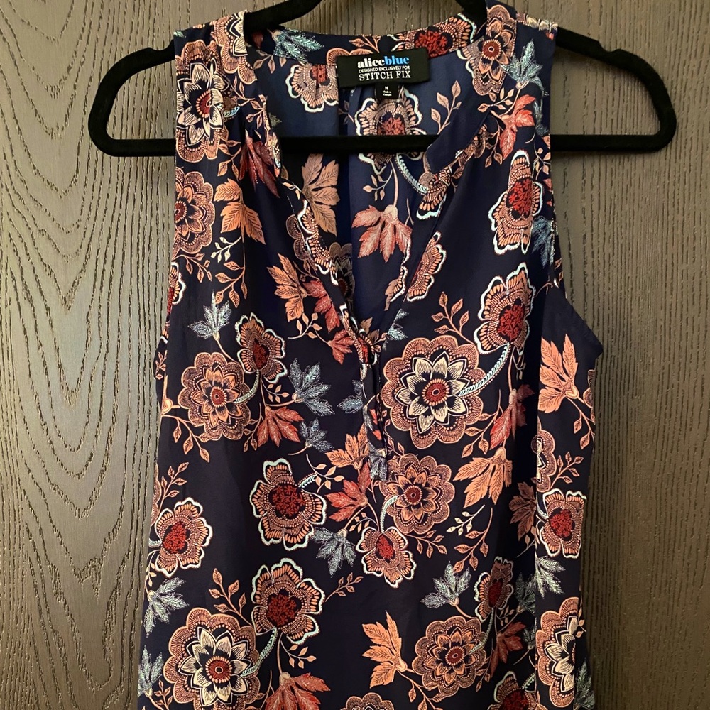 Navy floral sleeveless blouse